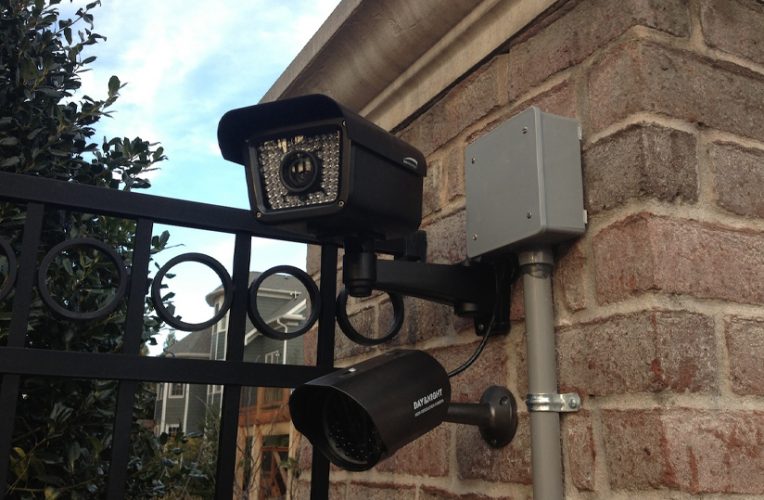 Wall mounted video surveillance cameras.