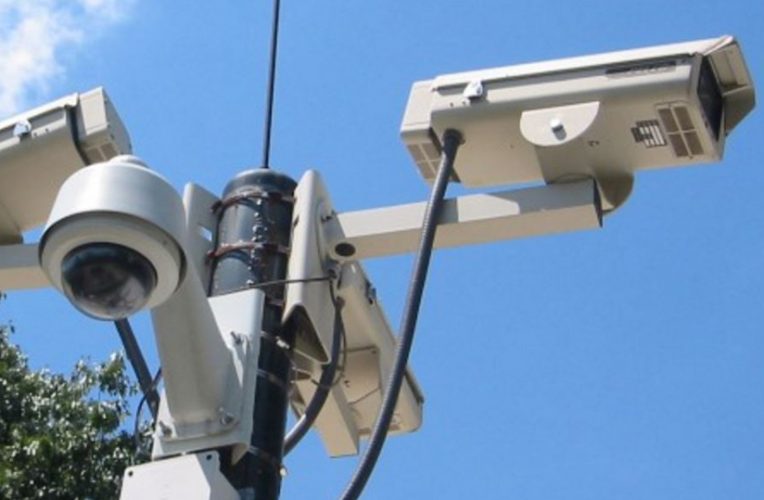 Mounted video surveillance cameras.